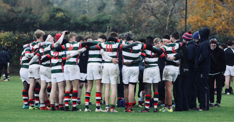 Rugby - Group Of People Doing A Group Hug