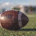 Football - Selective Focus Close-up Photo of Brown Wilson Pigskin Football on Green Grass