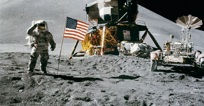 Moon Landing - Astronaut Standing Beside American Flag on the Moon