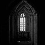 Architectural Feats - Monochrome Photo Of Dark Hallway