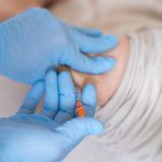Medical Breakthroughs - Nurse giving insulin injection to diabetic patient