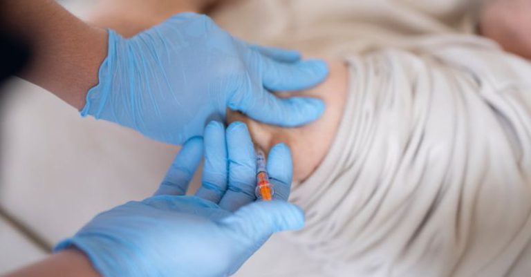 Medical Breakthroughs - Nurse giving insulin injection to diabetic patient