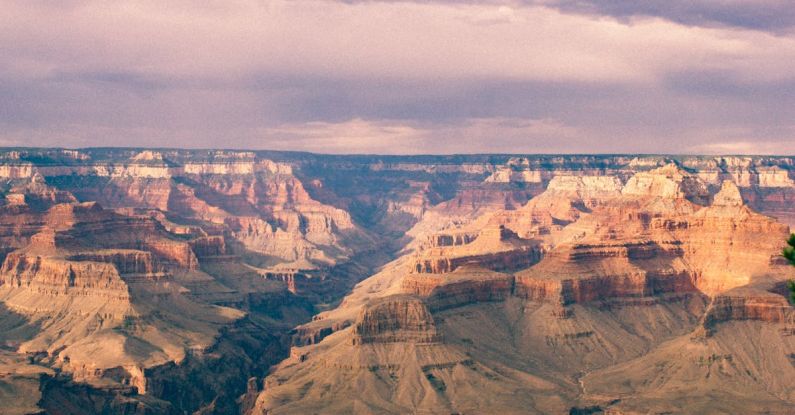 Grand Canyon - Brown Valley during a Grey Cloudy Sky