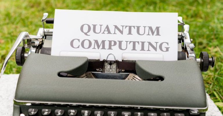 Quantum Mechanics - A typewriter with a paper that says quantum computing