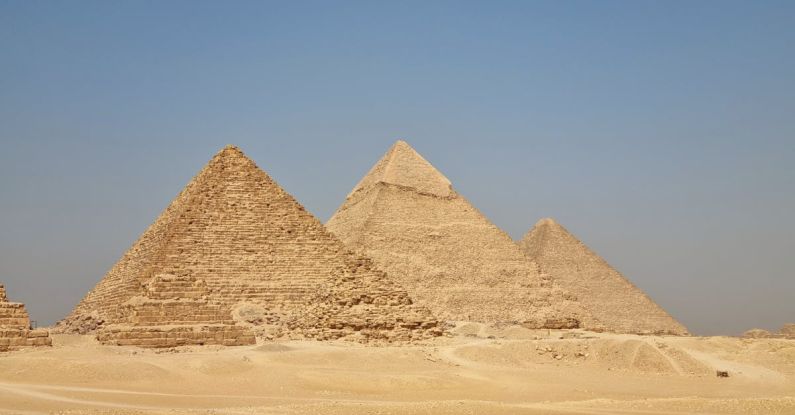 Pyramids Of Giza - Pyramids of Giza against Blue Sky