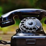 Telephone - Selective Focus Photography of Black Rotary Phone