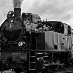 Steam Engine - Train on Railroad Tracks Against Sky