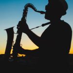 Jazz Music - Silhouette of a Man Playing Saxophone during Sunset