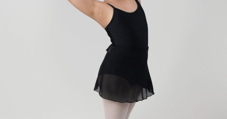 Ballets - A young girl in a black tutu and ballet shoes