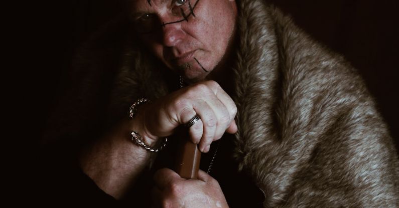 Norse Myths - An Elderly Man Wearing a Fur Coat